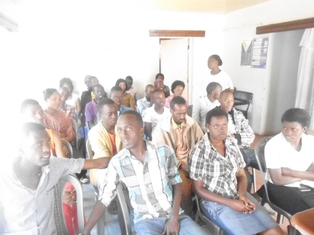 Young people seated in a room during a forum in Mathare